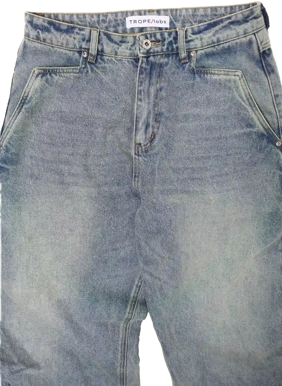 Close-up of front upper view of light blue Curve 1010 barrel jeans