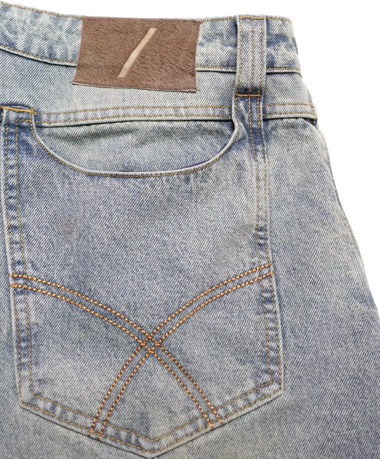 Close up of back pocket detail of light blue Curve 1010 jeans