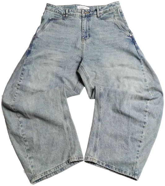 Front view of light blue Curve 1010 barrel jeans lying flat